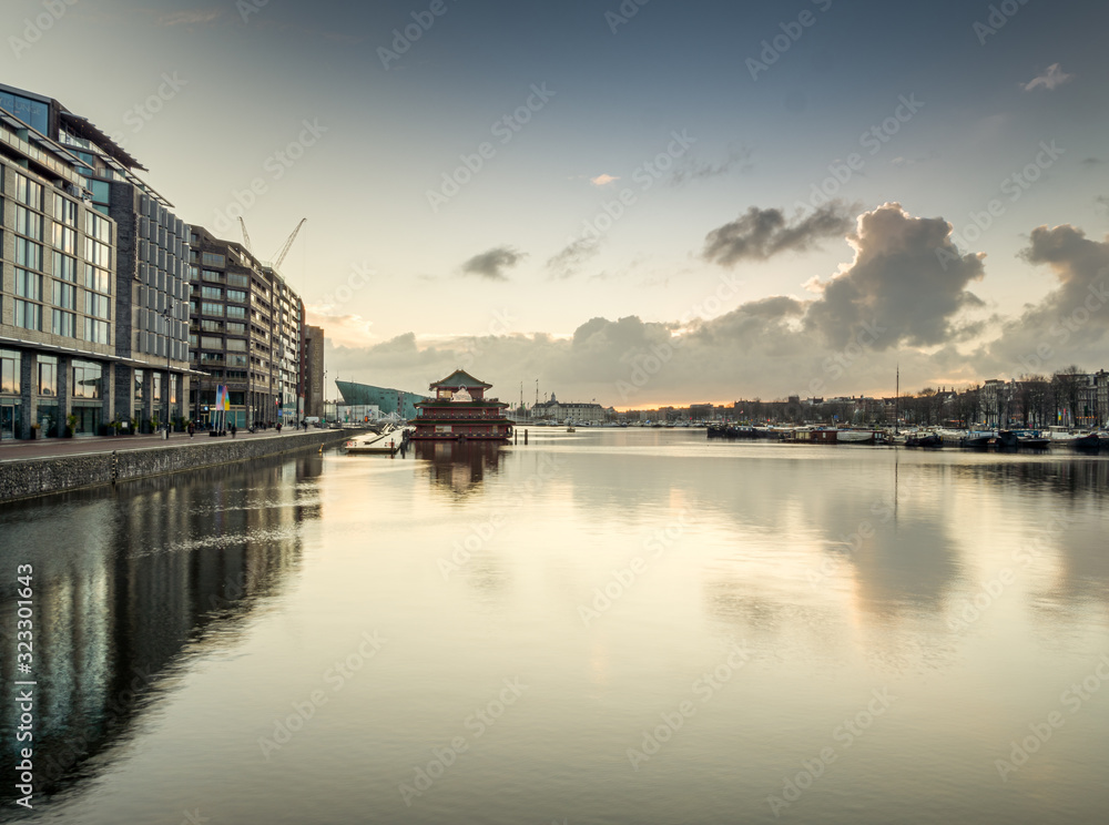 Amsterdam Port city shape during sunrise