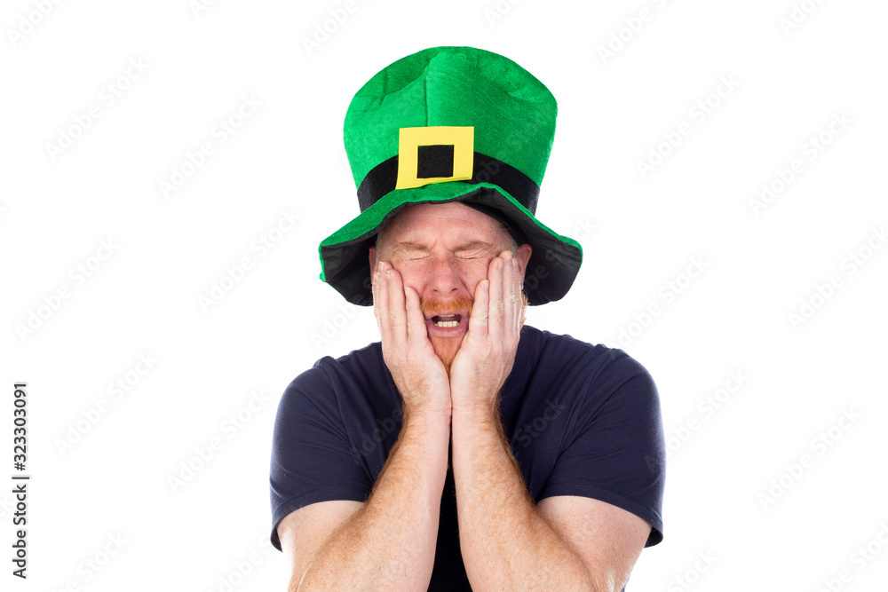 Surprised redhead man with green hat Surprised redhead man with green hat