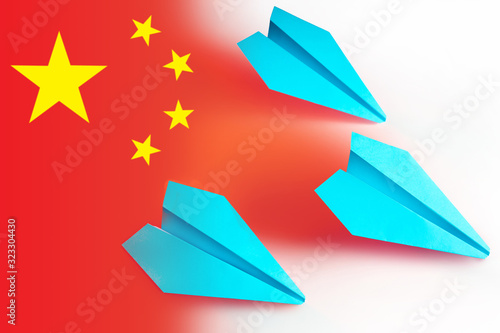 Three paper airplanes on th...