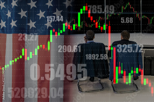 Exchange trade. Brokers on the background of the American flag and fluctuations in stock prices. Falling stock prices of American companies. American stock market. New York stock exchange.