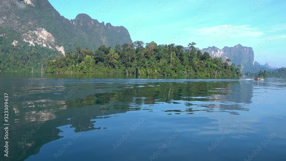 View from boat on Cheow Lan lake in National Park Khao Sok, Thailand, 4k View from boat on Cheow Lan lake in National Park Khao Sok, Thailand, 4k