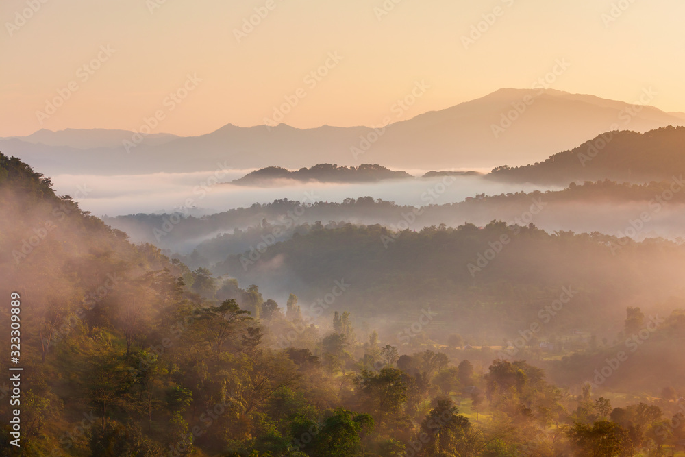 Himalaya hills in mist, sunrise landscape