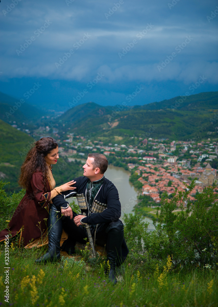 A man and a woman in the national dress of Georgia.. A man and a woman in the national dress of Georgia..