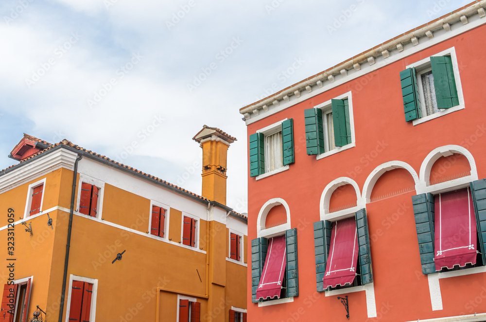 Fototapeta premium Beautiful window decorated with flowers in Italy