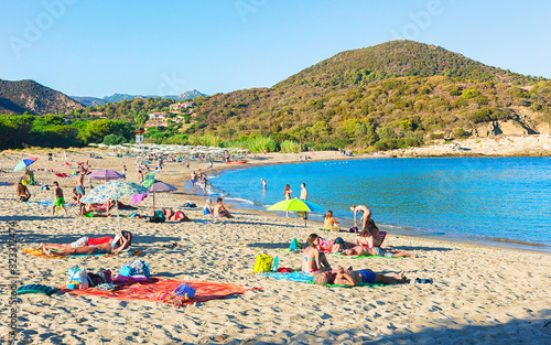 Fototapeta Naklejka Na Ścianę i Meble -  People on Chia beach at Mediterranian Sea Sardinia