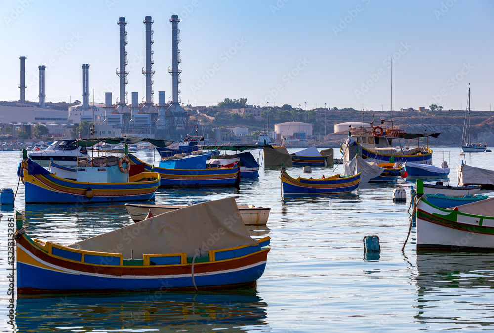 Marsaxlokk. Traditional boats Luzzu in the old harbor. Marsaxlokk. Traditional boats Luzzu in the old harbor.