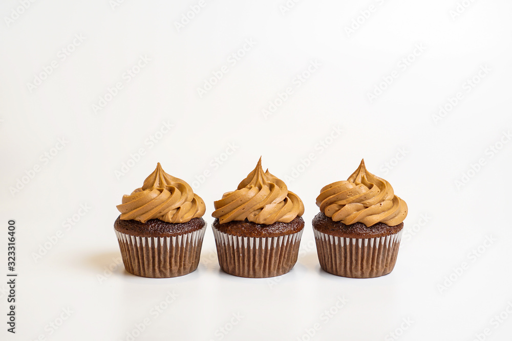 Three chocolate cupcakes Three chocolate cupcakes