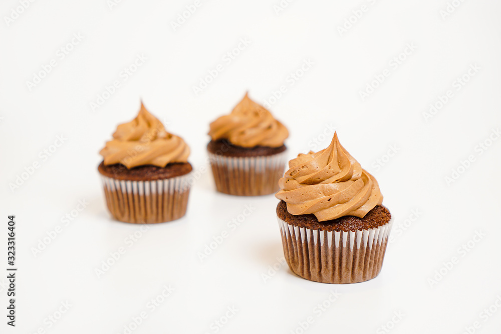 Three chocolate cupcakes