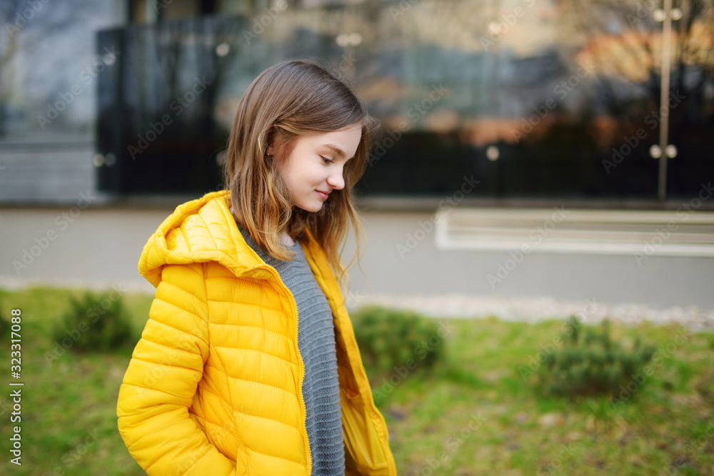 Cute young girl having fun on beautiful spring day. Active family leisure with kids. Cute young girl having fun on beautiful spring day. Active family leisure with kids.