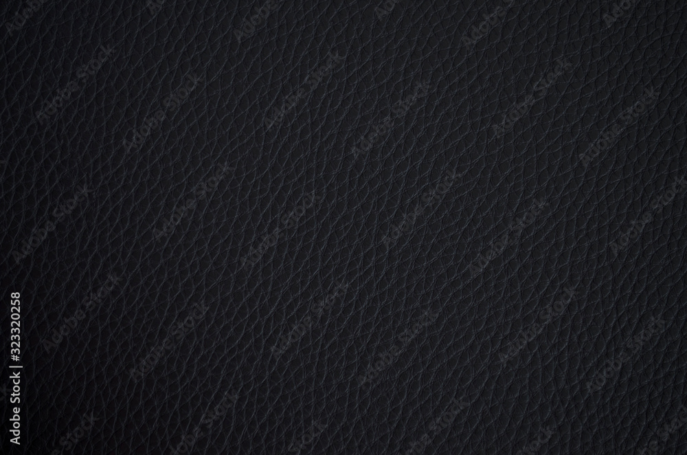 Leather texture close up. Black fashionable background, top view. Stylish wallpaper of grey color. Rough surface. Leather texture close up. Black fashionable background, top view. Stylish wallpaper of grey color. Rough surface.