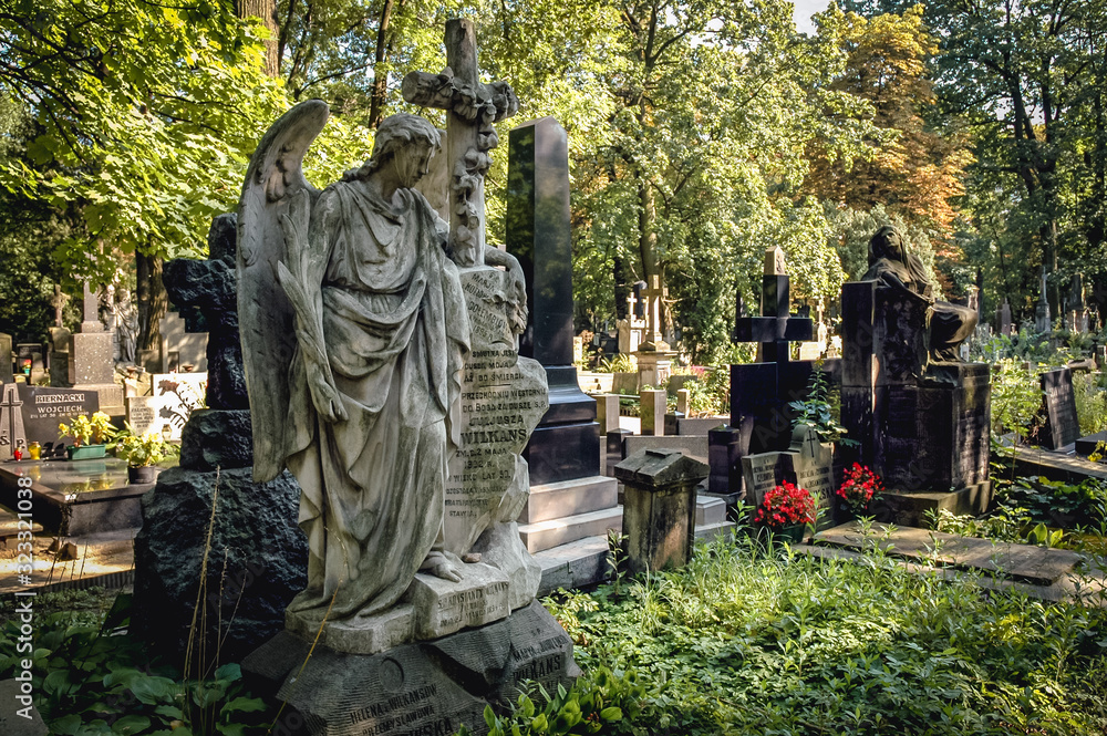 Angel grave statue in Stare Powazki - Old Powazki - historic cemetery in Wola District of Warsaw city, Poland