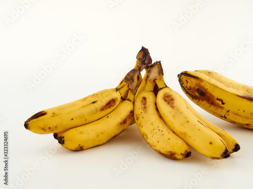 Lady Finger bananas.Cavendish bananas. Lie on against a colored background.