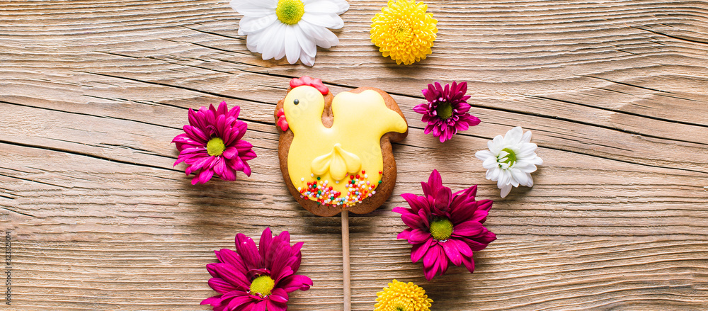 chicken shaped easter cookies on wooden background chicken shaped easter cookies on wooden background