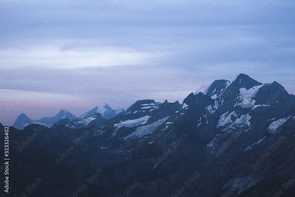 rocky snow-covered alpine rocky mountains