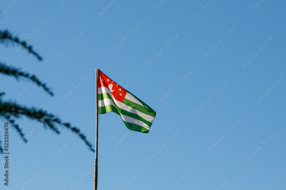 National flag of Abkhazia against the sky