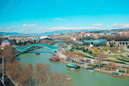 Tbilisi city panorama. Old city, new Summer Rike park, river Kura, the European Square and the Bridge of Peace