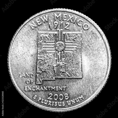 Фотография This quarter is for the state of New Mexico and conveys the nickname Land of Enchantment