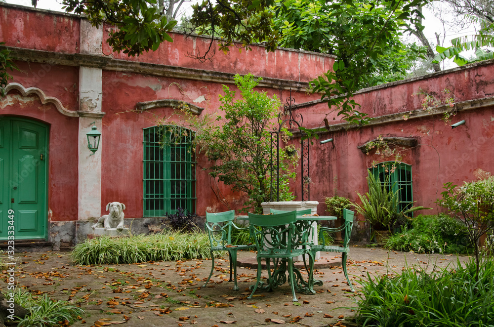 Front garden of the historic colonial-style mansion La Porteña