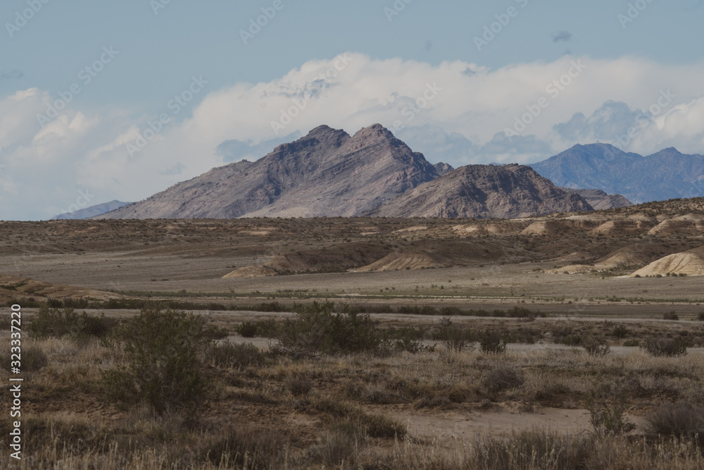 beautiful American landscape with mountain clouds and open range beautiful American landscape with mountain clouds and open range