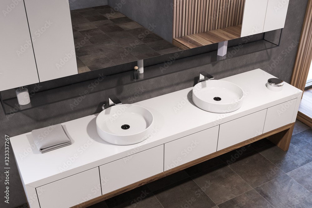 Fototapeta premium Double sink in gray and wooden bathroom, top view