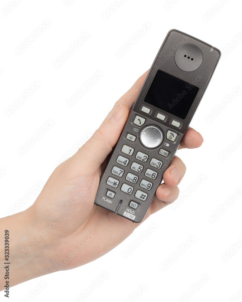 Female hand holds a phone, isolated on white background Female hand holds a phone, isolated on white background