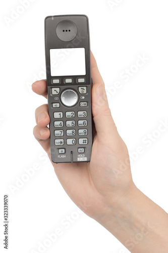 Female hand holds a phone with a blank screen, isolated on white background