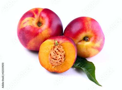 Nectarine peach fruits isolated on white