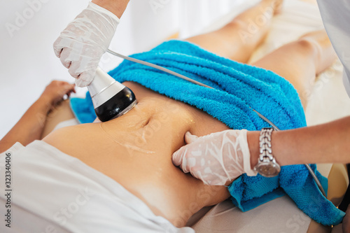 Cavitation RF body treatment and contemporary medicine for health beauty improvement and fat and cellulite removal