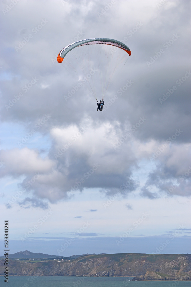 Paraglider above Newgale Beach, St Brides Bay, Wales Paraglider above Newgale Beach, St Brides Bay, Wales