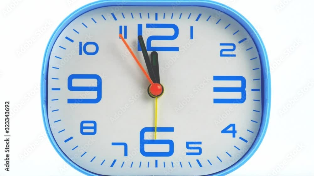 Blue Alarm clock face beginning time 11.58 am or pm on White background, Clock minute walk slowly, Time concept. Blue Alarm clock face beginning time 11.58 am or pm on White background, Clock minute walk slowly, Time concept.