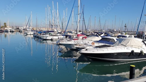 Larnacas Marina Port Finikoudes Cyprus. January 2020 Beautiful Larnaka Marina Deck, Cyprus in a sunny weather.  photo