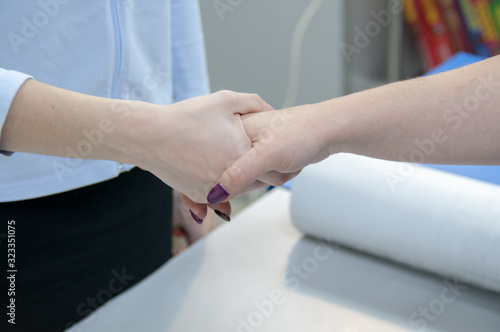 Handshake in the office  the concept of signing a contract