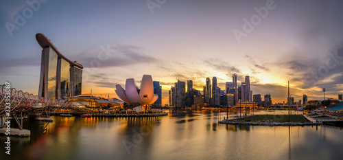 Singapore view from Marina Bay with all the iconic attraction: Art & Science museum, central district, Helix Bridge