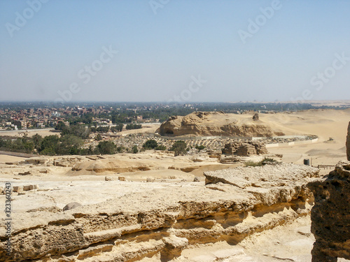 Egyptian landscapes of the desert, Nile and Arab buildings. Travel concept.
