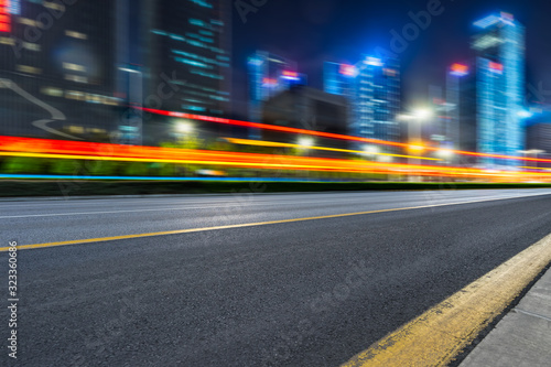 traffic with blur light through city at night. © hallojulie