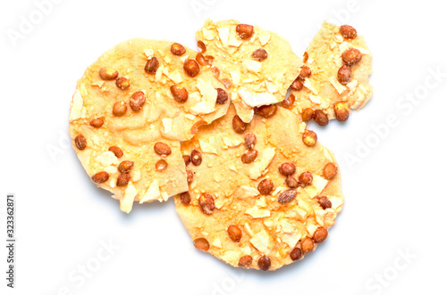 Top view of Thai snack-fried peanut with wild yam on the isolated white background
