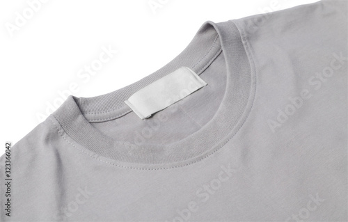 Leinwand Poster Blank tag of grey t-shirt for your design isolated on white background