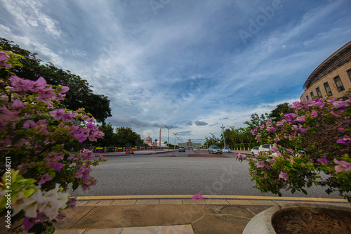 Wide Angle panorama of the Dataran Putra or Putra Square in the government city of Putrajaya, Malaysia, 40 km outside of Kuala Lumpur. The Boulevard with the government seat and Kelab Tasik Mosque photo