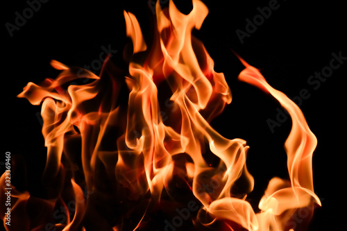 Close-up shot of the fire on black background © Sahil Ghosh