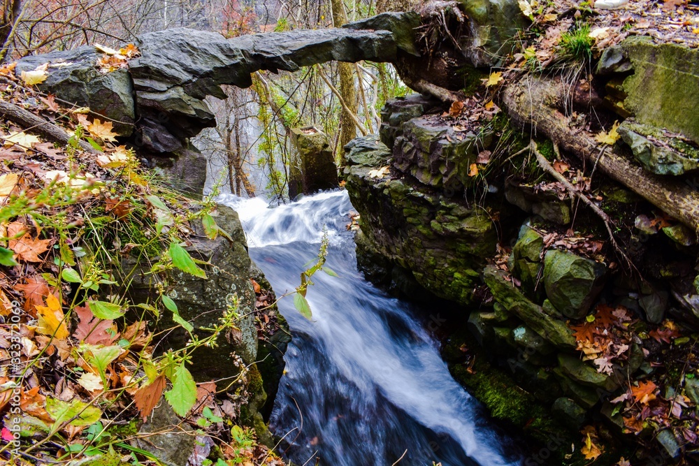 Fototapeta premium Rapid River Flowing Over the Cliff Side