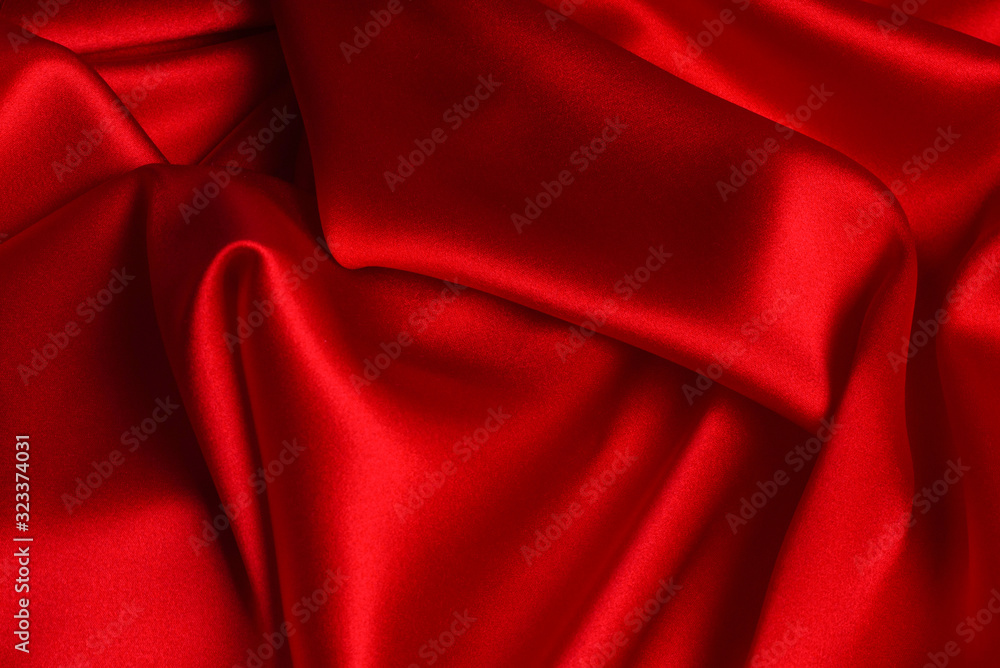 Red silk or satin luxury fabric texture can use as abstract background. Red silk or satin luxury fabric texture can use as abstract background.