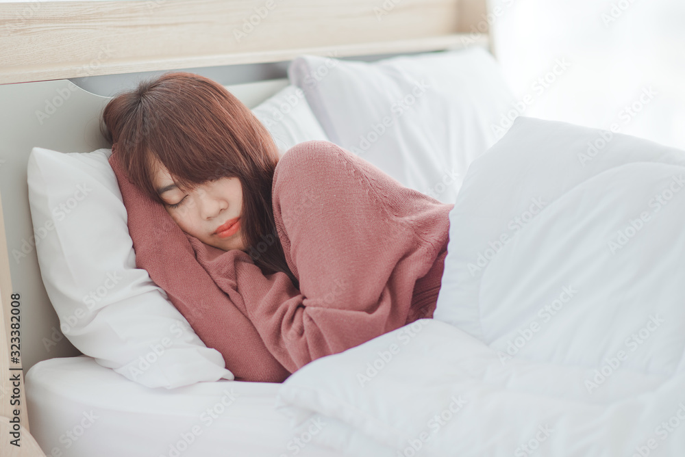 Woman sleeping,Young beautiful Asian woman sleeping on white bed Woman sleeping,Young beautiful Asian woman sleeping on white bed