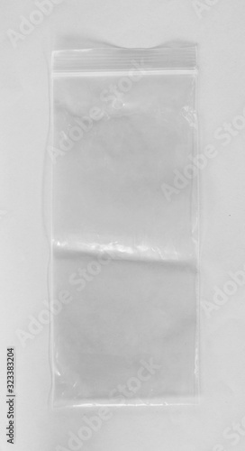empty plastic zipper bag on white