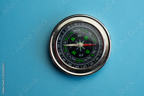 marine compass with movable arrow, reference point