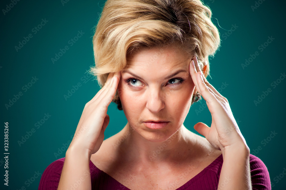 Woman thinking hard about something. People, lifestyle and emotions concept Woman thinking hard about something. People, lifestyle and emotions concept
