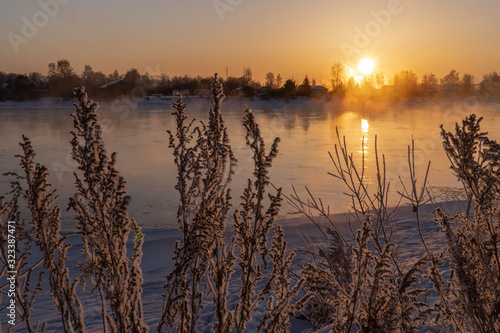 Winter sunrise on the banks of the Angara