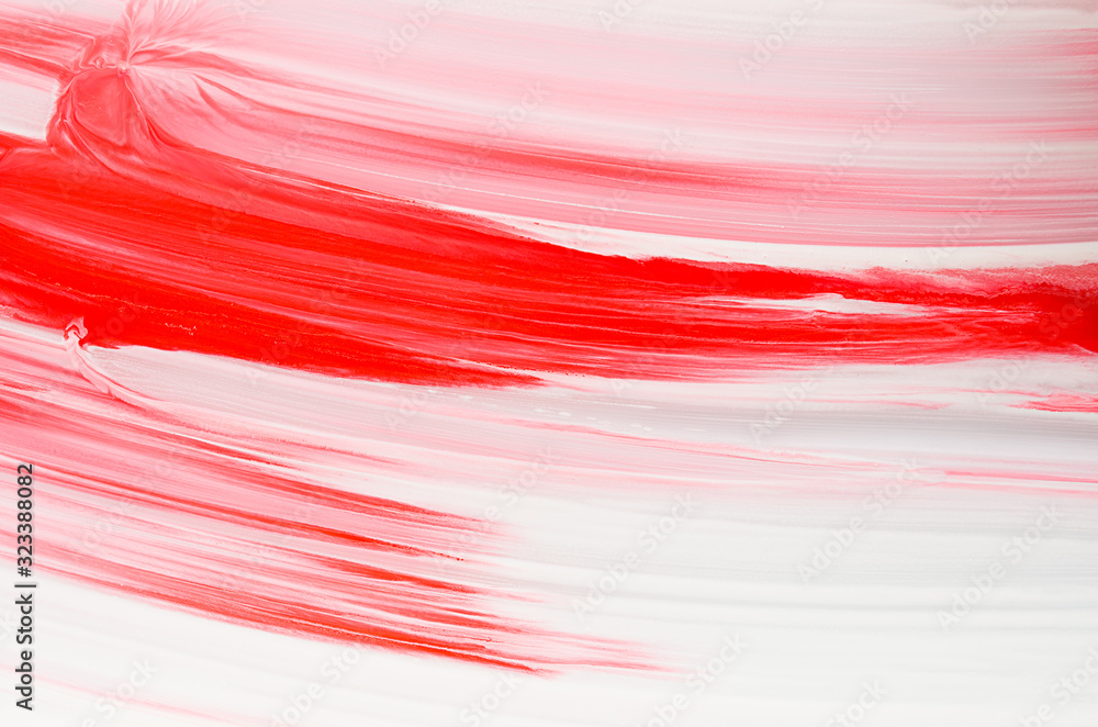 Expressive scarlet red and white stripe and wave of brush strokes of liquid paint as abstract background, texture.