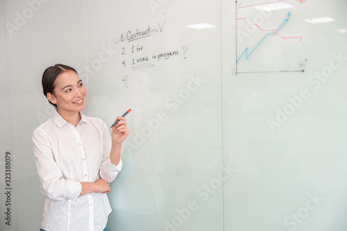 Asian woman is working in office