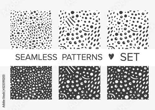 Simple animalistic abstract seamless patterns with spots and dots. Background for decoration, wrapping paper, wallpaper, cards and greetings. Minimalistic wild style two colors