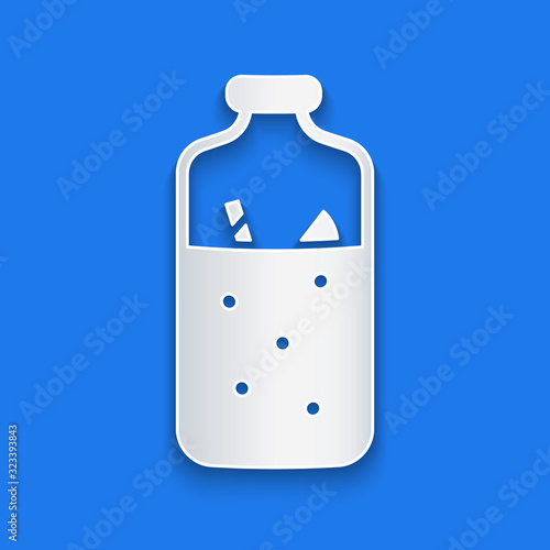 Paper cut Mulled wine with ingredients icon isolated on blue background. Cinnamon stick, clove, lemon slice. Paper art style. Vector Illustration